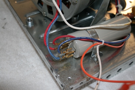 Disconnect the red, blue and white wires from the motor.